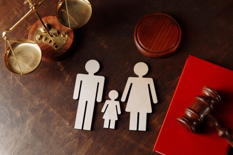 judges-gavel-red-book-family-figures-scaled